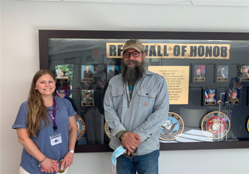 Mr. and Mrs. Pagano get a closer look at the Wall of Honor
